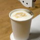 Illustration for article titled Barista Bot Paints Your Portrait On Your Latte